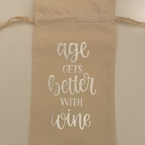 Handmade wine bag with the words “Age gets better with wine” in silver.
